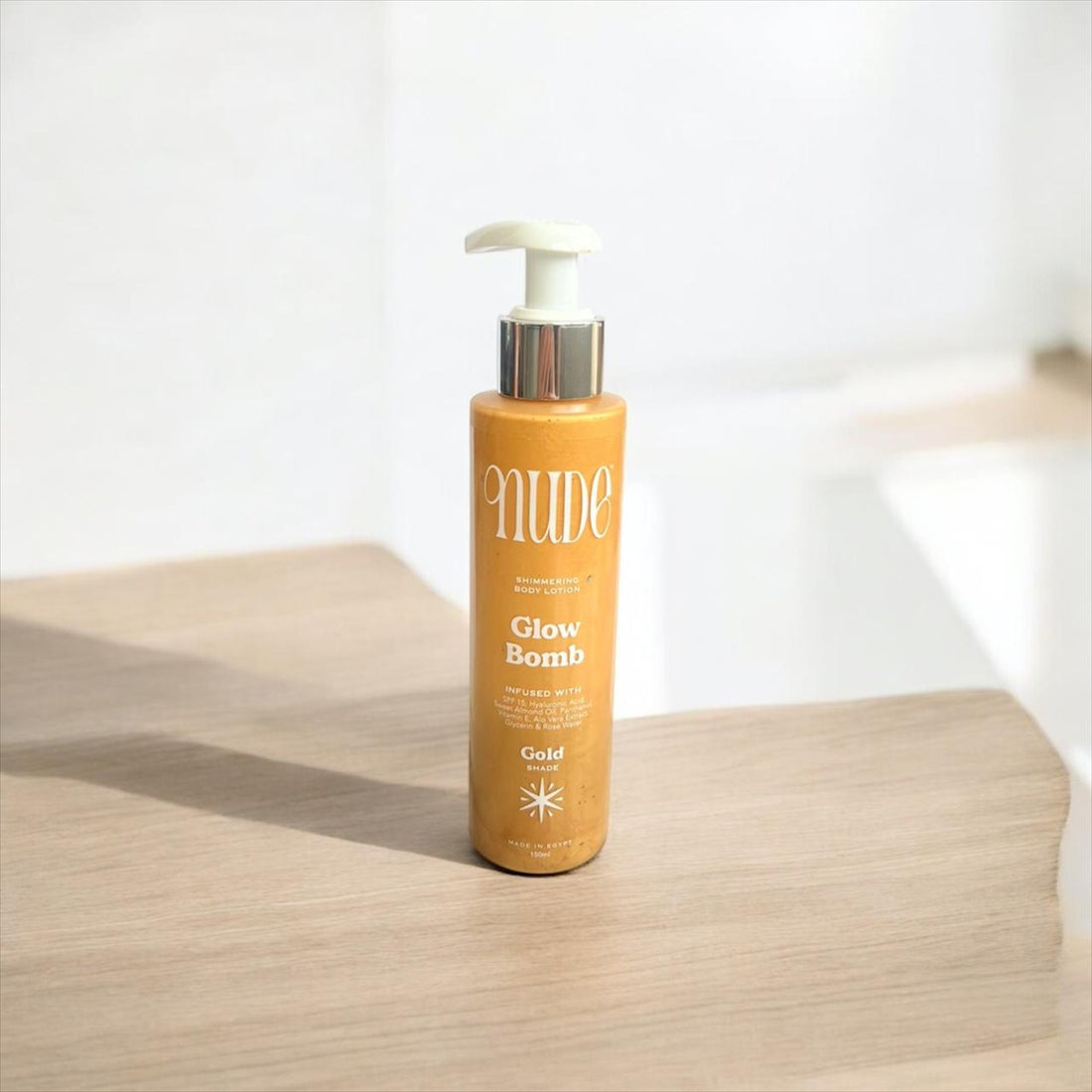 Shop Nude's Glow Bomb (Gold Edition) SPF15 on ZYNAH